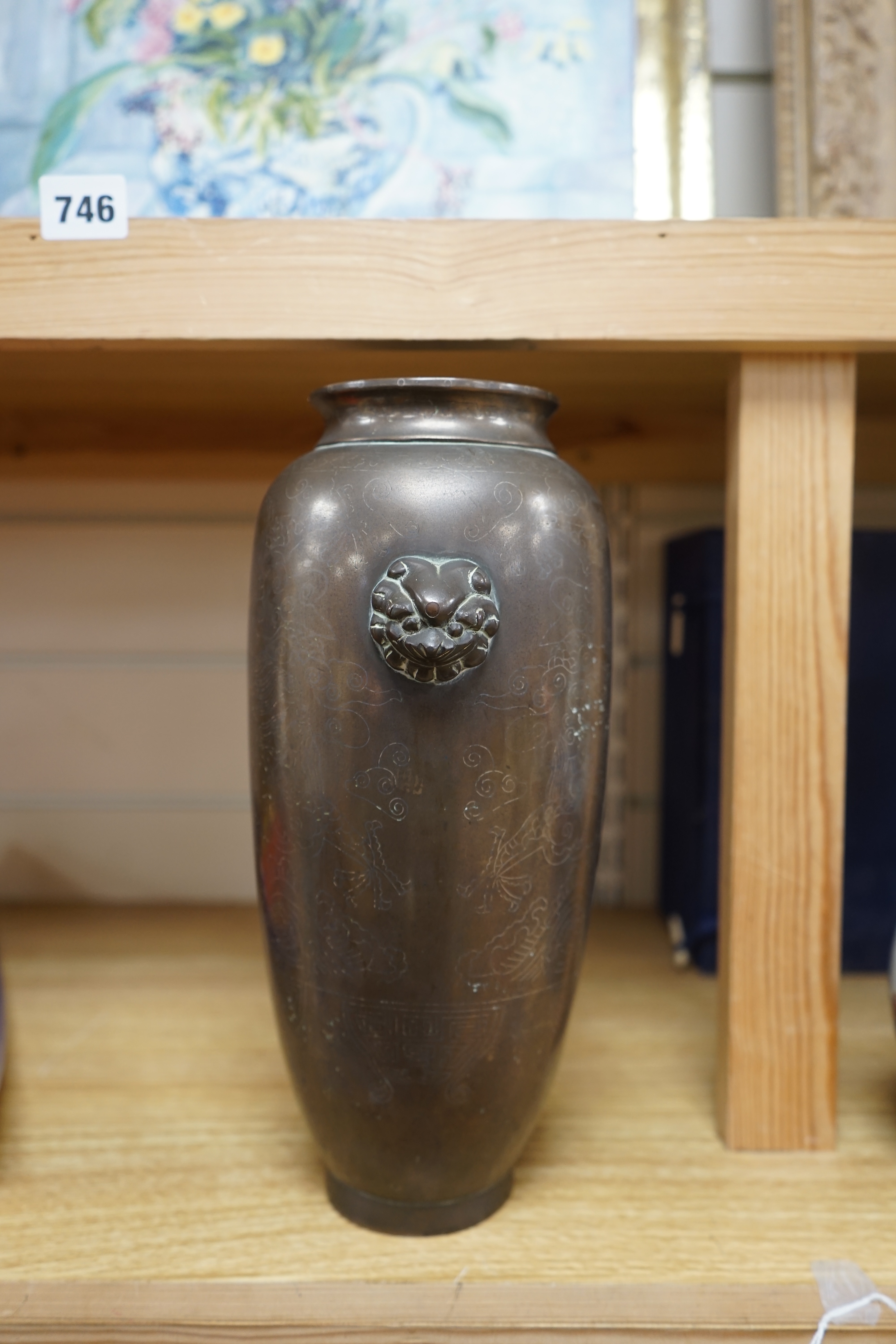 A tall 19th century Chinese silver inlaid bronze twin handled vase, signed ‘Shisou’ to the base, 30cm high. Condition - fair to good